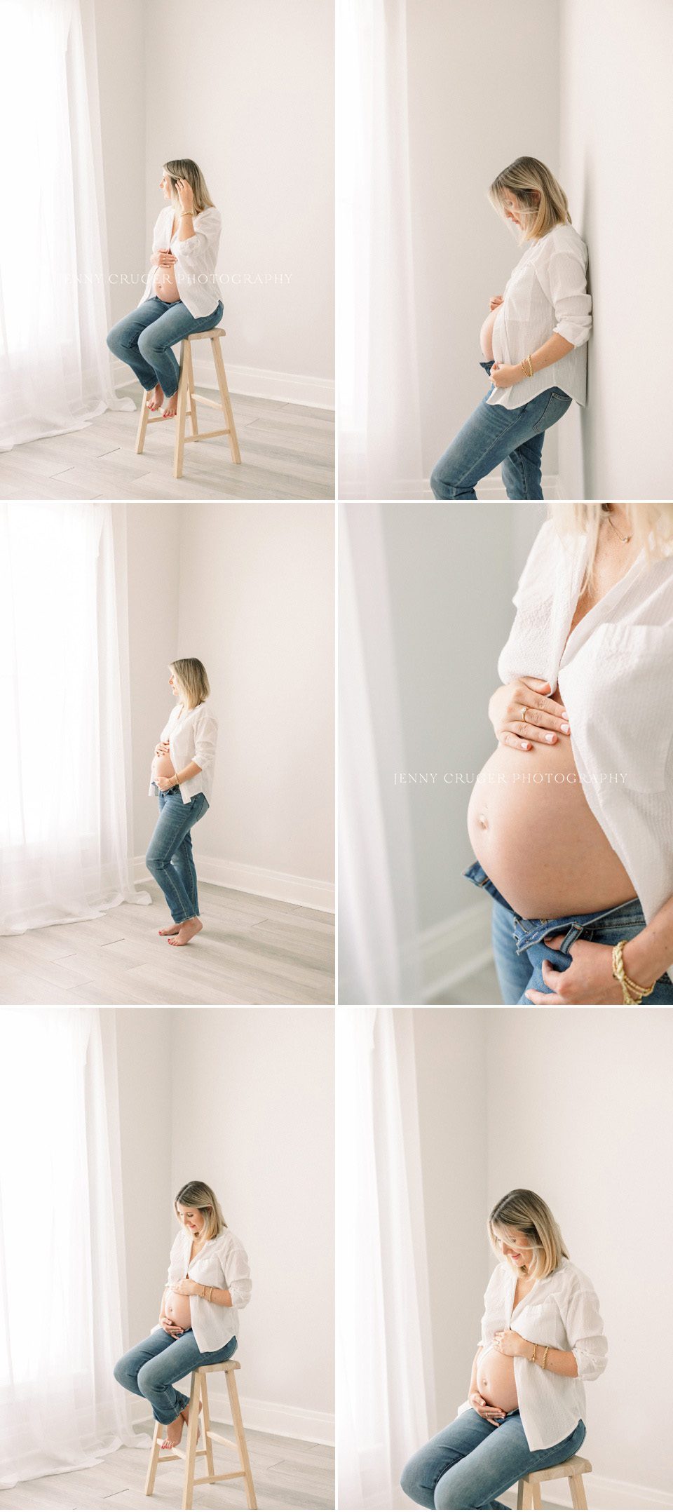 Natural maternity portrait with mother resting against a white wall, wearing denim and an open white blouse.