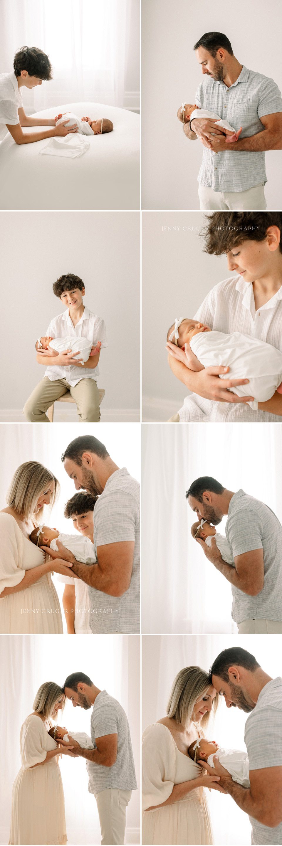 Big brother sitting close and gently leaning toward the newborn on the bed.